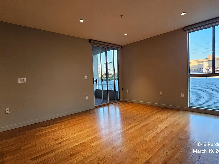 Living area has a balcony share with main bedroom