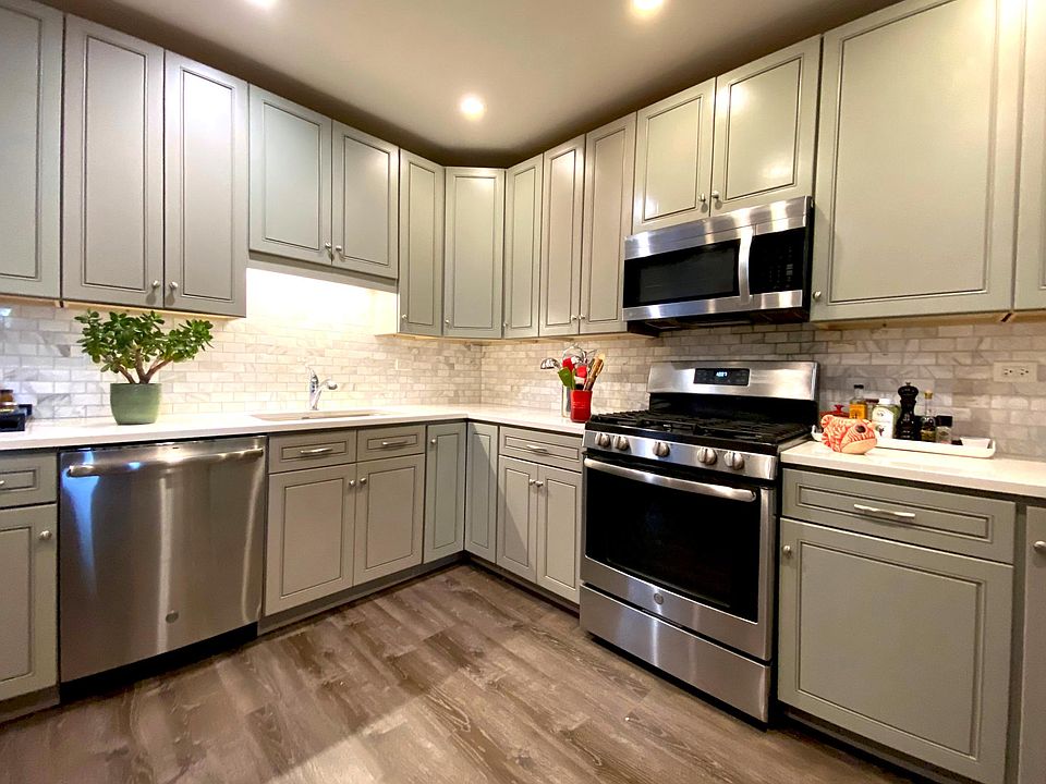 Kitchen with stainless steel appliances and quarts countertops