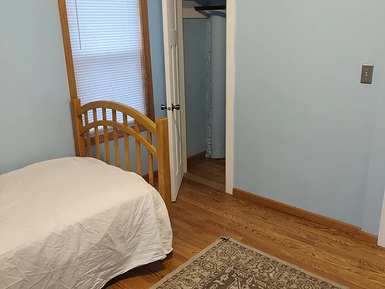 1st bedroom - view from corner .