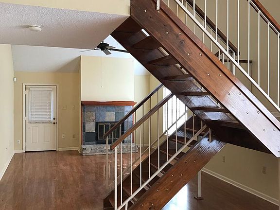 High ceilings in dining and family room. End unit with extra windows give the unit lots of natural light not available in most.