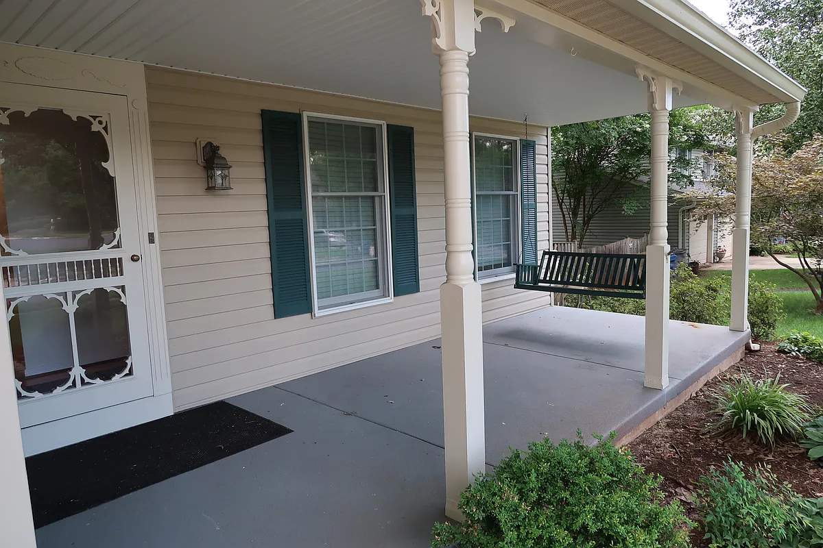Welcoming and Relaxing front Porch with swing. - 12502 Cliff Edge Dr