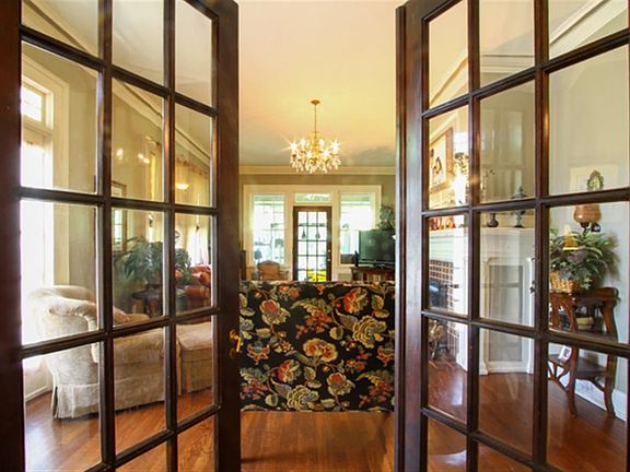 French doors b/t Den and LR