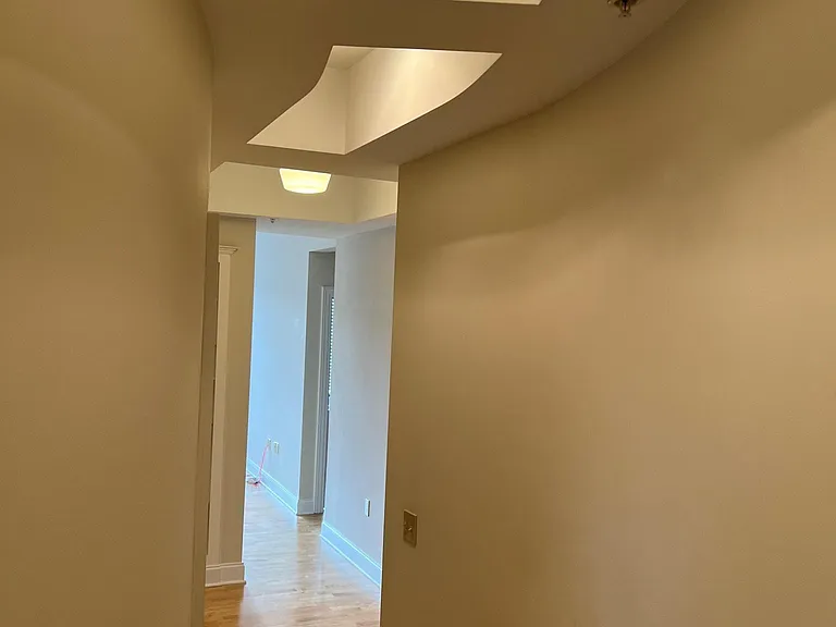 Curved wall in hallway to bedrooms