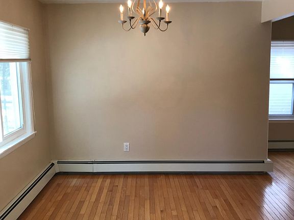 Dining Room/Area- connected to living room with the stone fire place