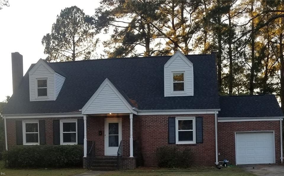 Brick 2 story Cape Cod on large corner.  Roof is Brand New --- October 2020.
House also has replacement windows.