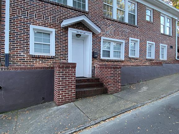 Side Photo of Building Showing Entrance to Apartment