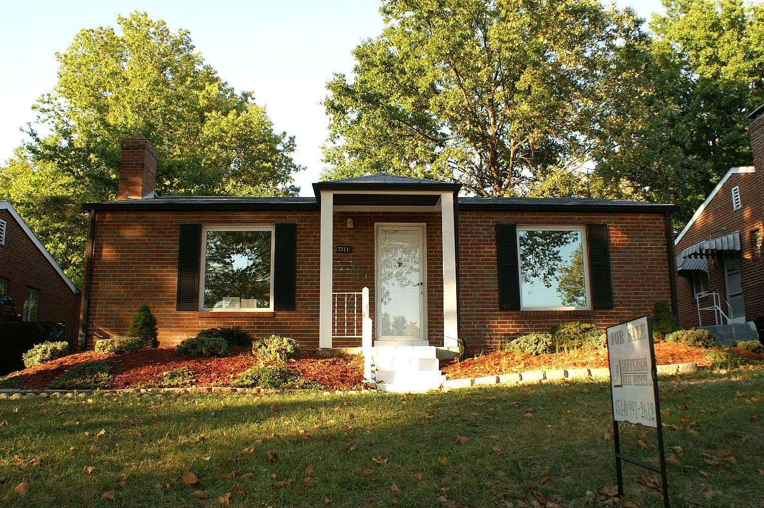 7711 Wellington Ave photo 1