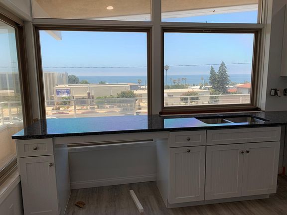 Ocean view out of your gourmet kitchen off of your beautiful 100+ foot deck