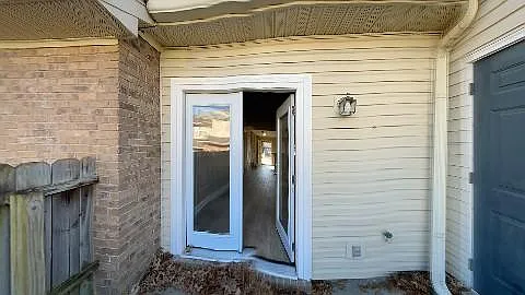 Backdoor entrance with lots of natural lights and extra storage on the left side.