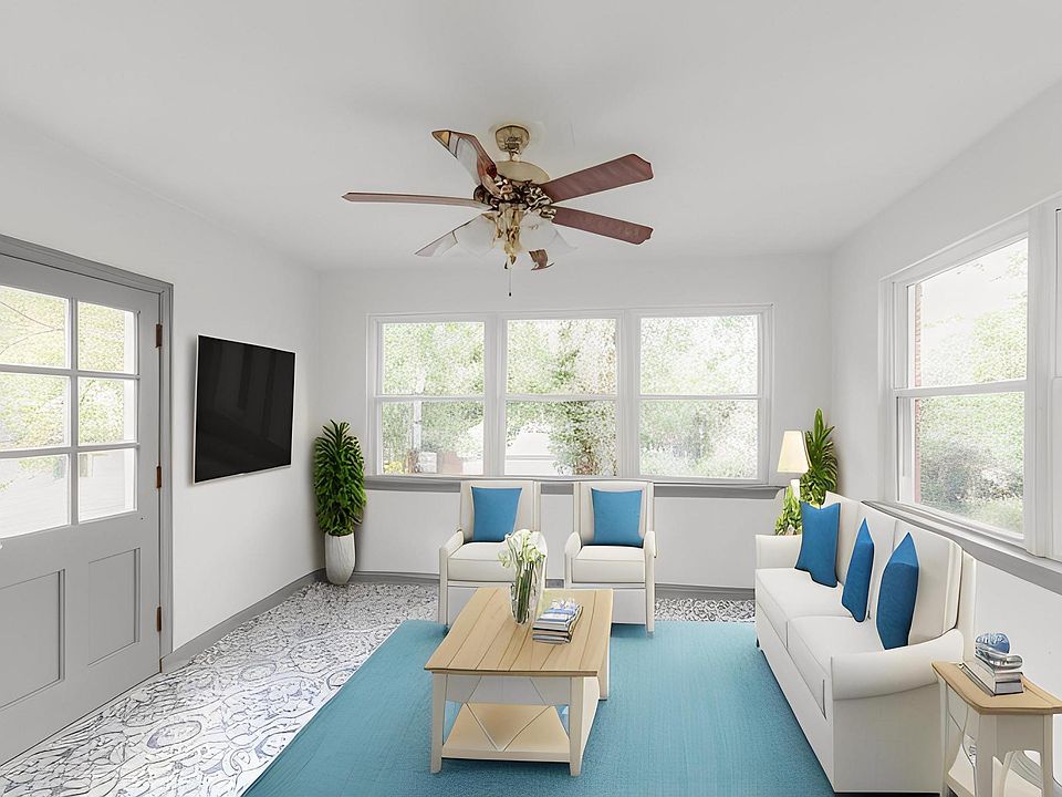 This sunroom will be your favorite part of the house, as the new windows provide a view of the green spaces surrounding the house. Read, lounge, snooze, entertain, watch TV....so many uses for this space.