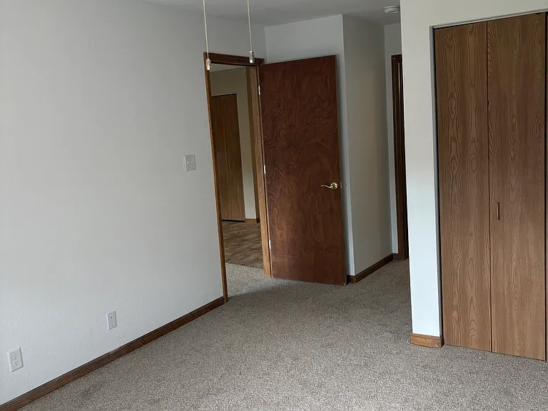 master bedroom, closet seen and walk in closet around the corner