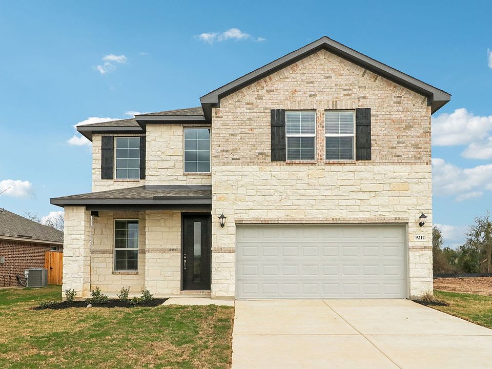 Front exterior of the Medina floorplan at a Meritage Homes community.