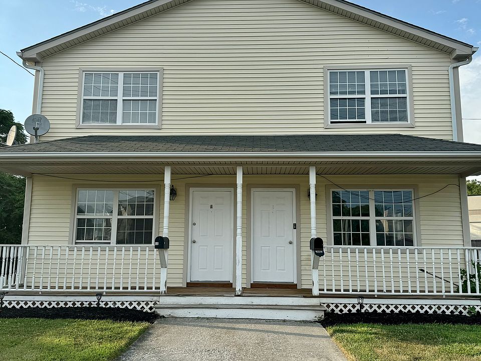 Front entrance with private 2 car driveway on the side entrance.