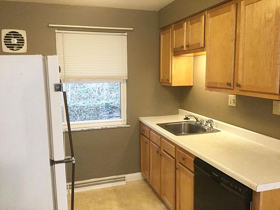 Kitchen with Dishwasher, electric range and refrigerator