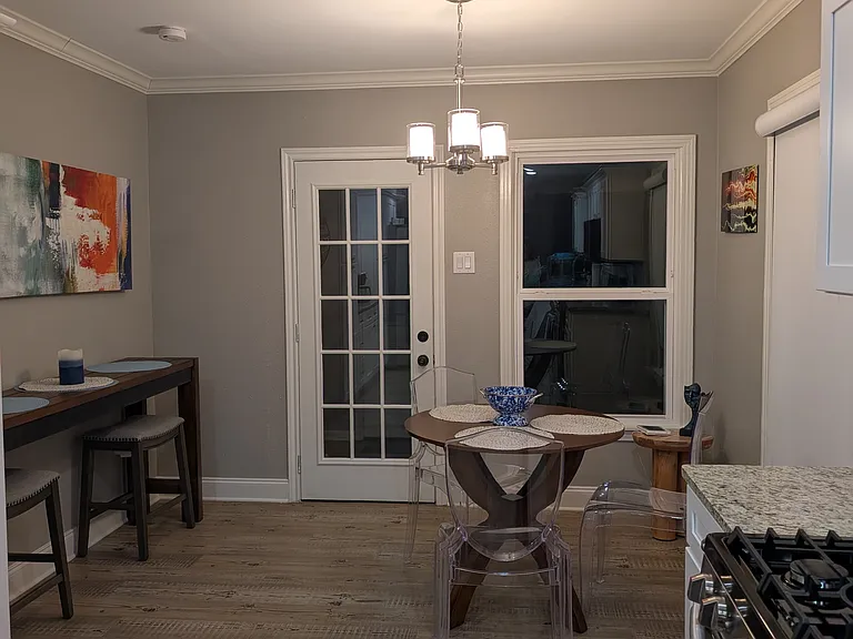 The breakfast (or lunch or dinner) area. The door leads to the laundry area and the back door.