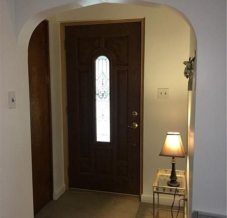 The 5x4 entry way has ceramic tile flooring a new insulated front dor and a spacious coat closet.