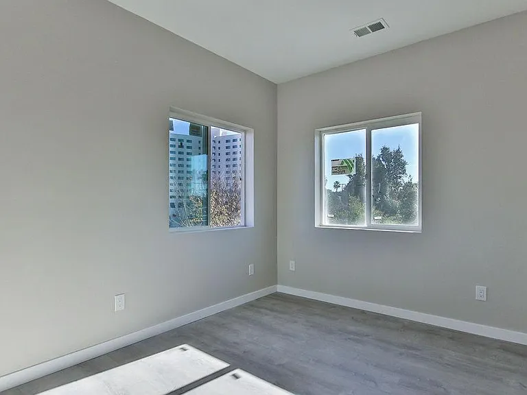Upstairs bedroom facing backyard