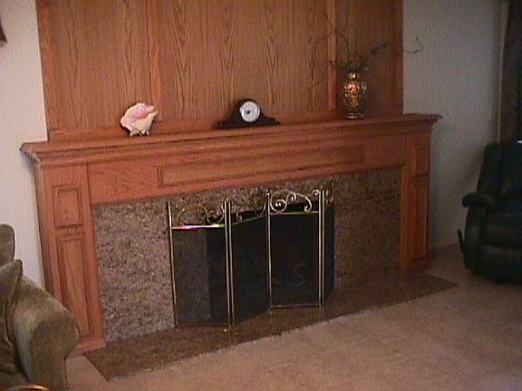 wood and granite fireplace