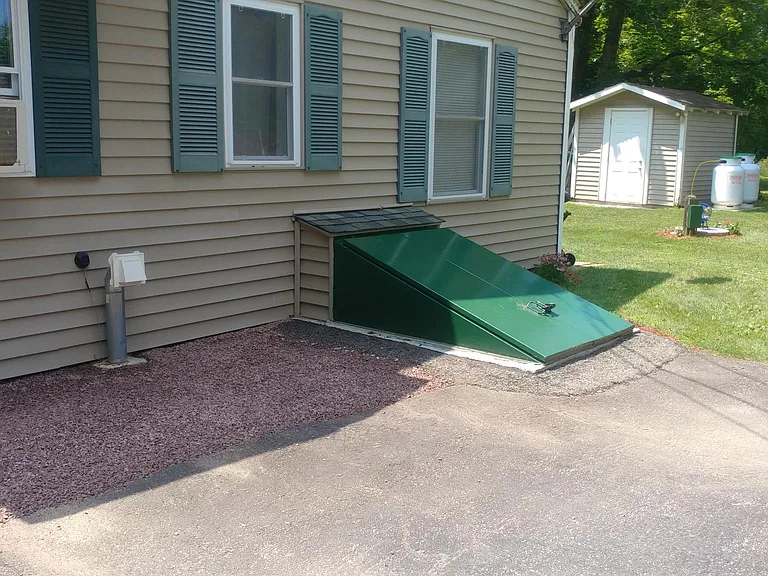 Secured entry to enter basement for private laundry use.