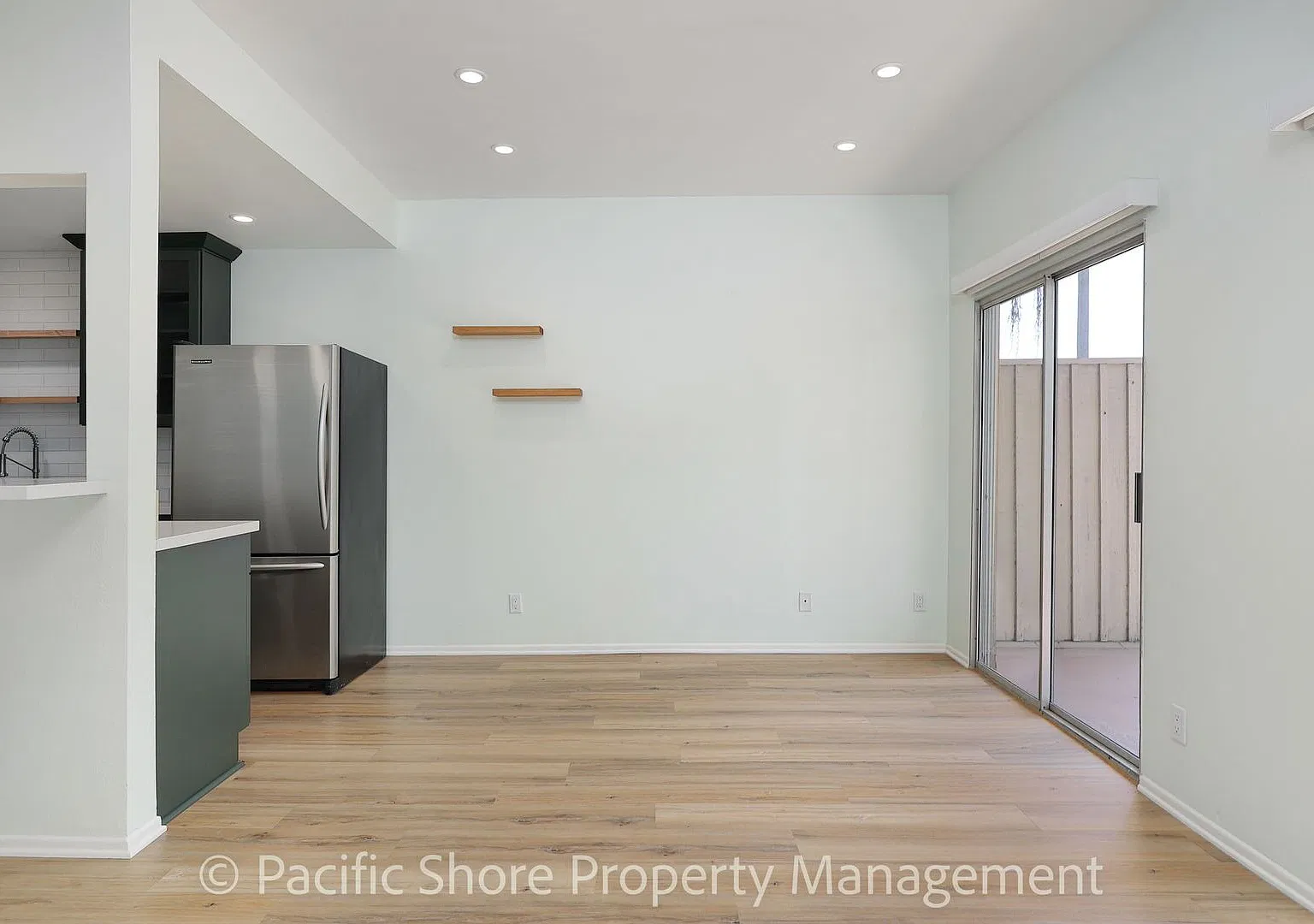 Stunning Remodeled 2-Bedroom Condo in Brentwood with Private Balcony & Pool! — Photo 3
