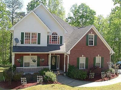 FRONT OF HUGE HOME