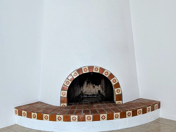 Living rm. with wood burning firepl.