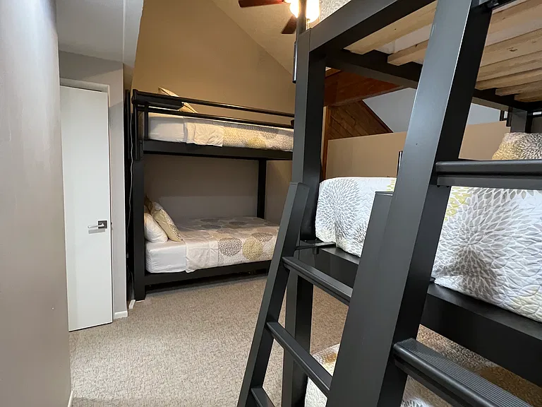 Bunk bed room: FIVE QUEEN SIZED bed, very sturdy- has 1 double and 1 triple bunk beds in same room