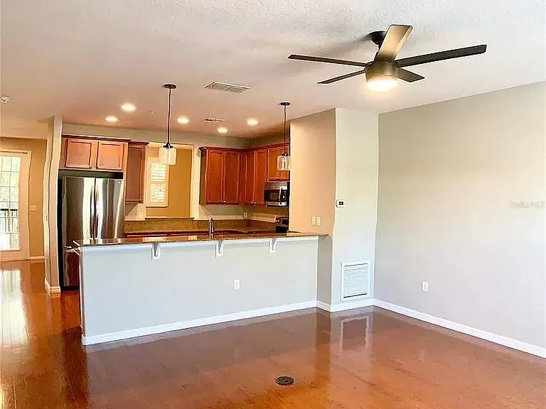 Open Kitchen w/ High End Appliances, Granite Counters & Cherry Wood Floors