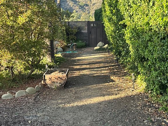 Pathway to primary gate into 2479 Fordyce private yard
