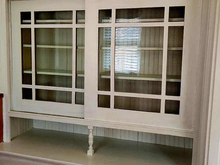 Butlers pantry has lots of deep storage