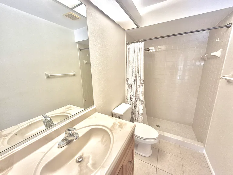 Main bathroom, tiled.