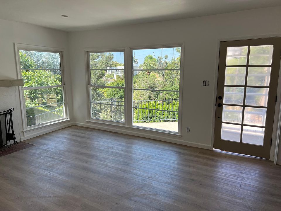 View of living room facing windows with view