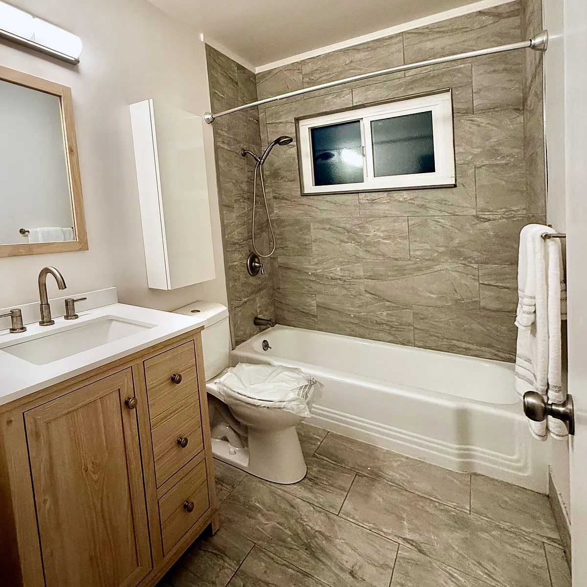 Completely Remodeled Unit : Hall Bath with Premium Imported Italian Tiles. - 5720 Colfax Ave #1