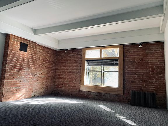 Exposed brick in living room