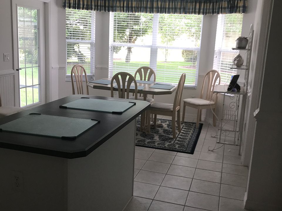 Kitchen with large bow windo
