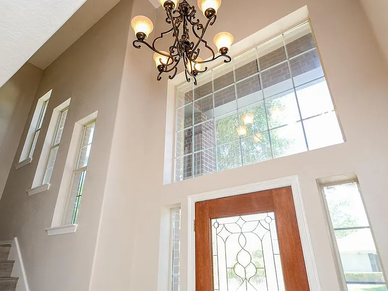 High Ceiling entry with beautiful chandelier