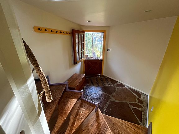Foyer from winding stair landing.