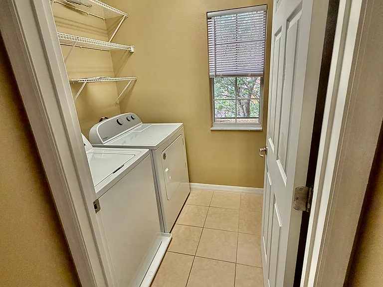 In unit washer and dryer with designated laundry space