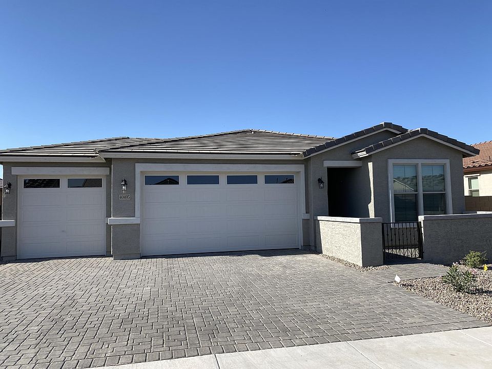 Front Courtyard and 3 Car garage