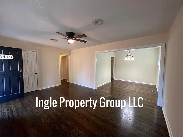 Front living room with view into dining room