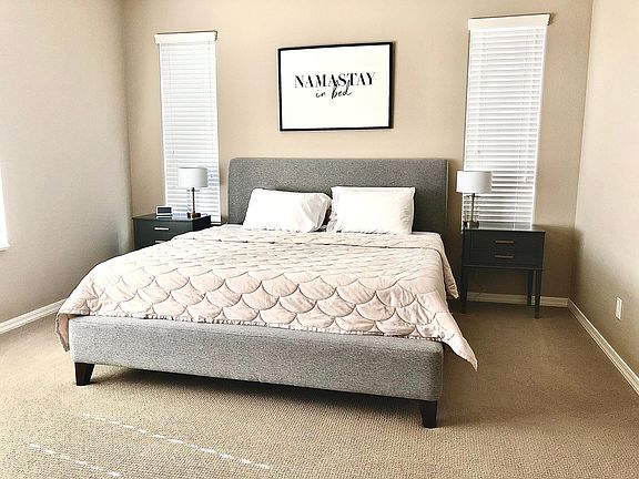 Master bedroom with king size firm memory foam mattress, TV, night stands etc.