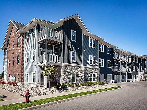 Private patios, balconies, and attached garages make every apartment at 32 Union feel a little more like home. Bonus: the landscaping team keeps it looking sharp year-round.