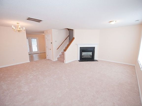Large living Room with New Paint and Carpet