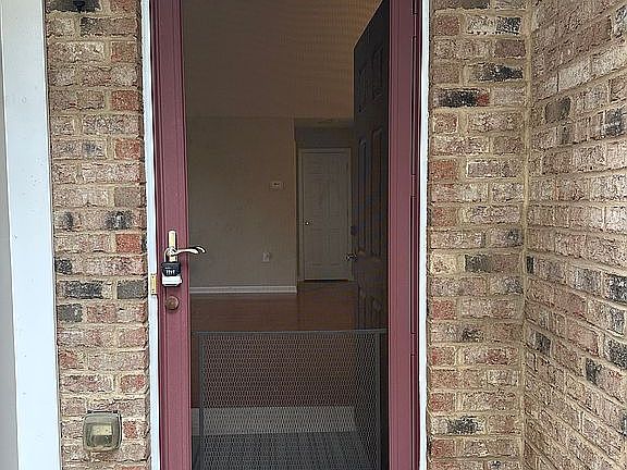 Front door (storm door view)