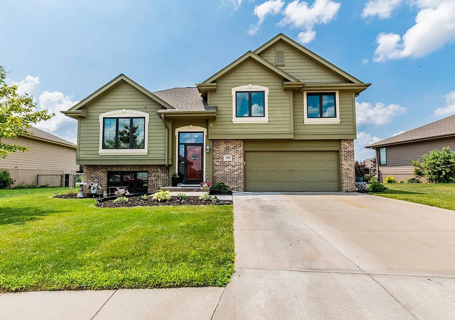 **Spacious 4-Bedroom Home in Lewis Central School District 2-Car Garage & Large Yard** — Photo 1
