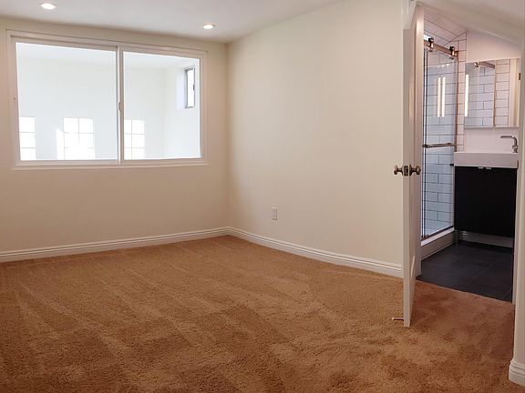 Loft Bedroom with attached bathroom and walk in closet