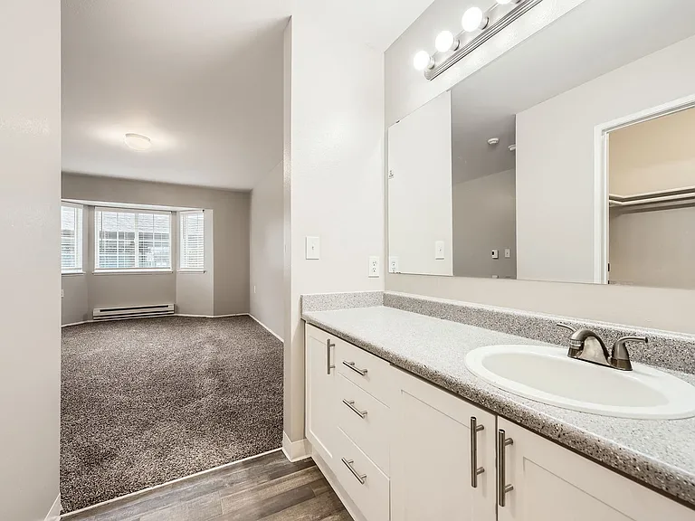 Primary bathroom in a two-bedroom two-bath apartment at Capitol City in Lacey, WA