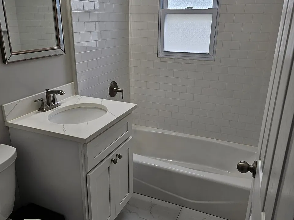 Bathroom with shower and tub