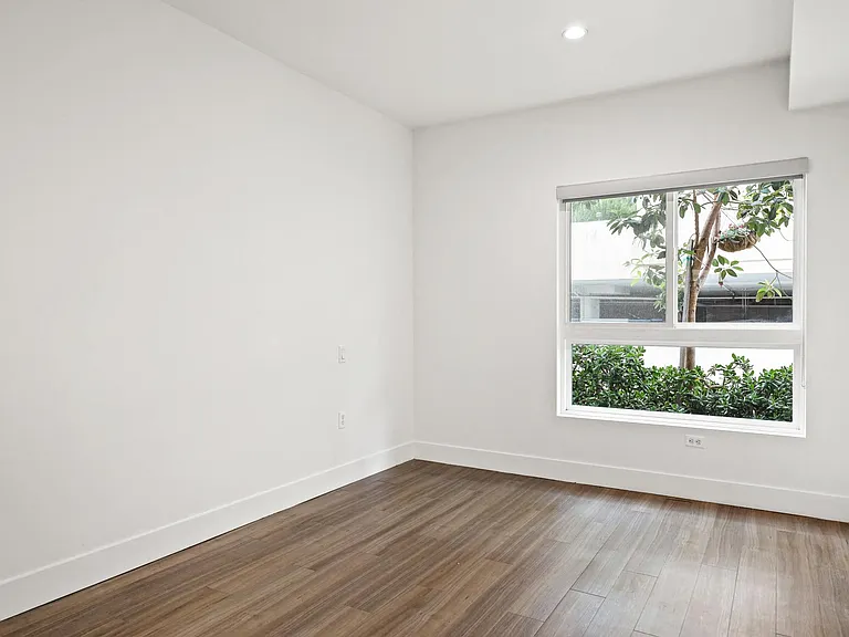 Bedroom with Recessed Lighting, Vinyl Flooring, and Large-Size Windows