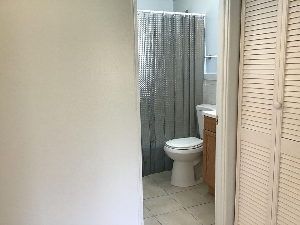 Shower/tub combo. Utility closet on the right